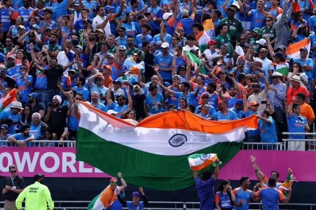 India fans celebrate after winning the match (REUTERS)