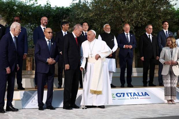 U.S. President Joe Biden, Pope Francis, Italy's Prime Minister Giorgia Meloni, Canada's Prime Minister Justin Trudeau, German Chancellor Olaf Scholz, Britain's Prime Minister Rishi Sunak, Japan's Prime Minister Fumio Kishida, India's Prime Minister Narendra Modi, chairperson of the African Union and Mauritania's President Mohamed Ould Ghazouani, Turkey's President Recep Tayyip Erdogan, Akinwumi Adesina, president of the African Development Bank pose for a family photo on the second day of the G7 summit at the Borgo Egnazia resort, in Savelletri, Italy. REUTERS