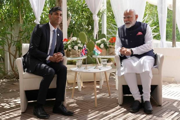 British Prime Minister Rishi Sunak, left, attends a meeting with Prime Minister of India Narendra Modi, center, on the sidelines of day two of the 50th G7 summit, in Borgo Egnazia, southern Italy. AP/PTI