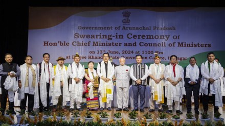 Arunachal Pradesh Chief Minister Pema Khandu and Governor K.T. Parnaik with newly inducted cabinet ministers during the swearing-in ceremony, in Itanagar. (PTI Photo)