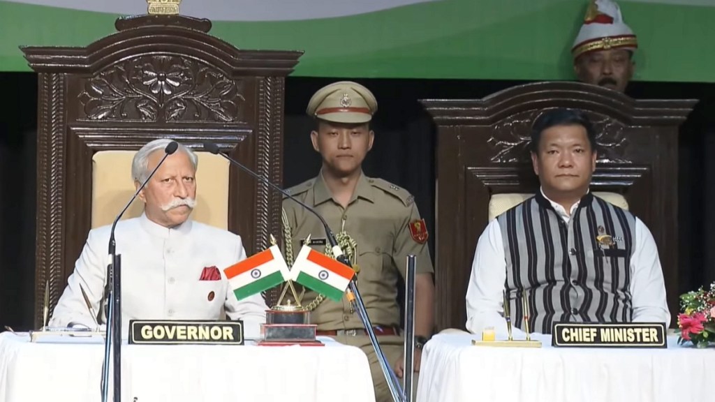 Arunachal Pradesh Governor Kaiwalya Trivikram Parnaik with state CM Pema Khandu after administering him oath of office, at the DK State Convention Centre in Itanagar, Thursday, June 13, 2024. (PTI Photo)