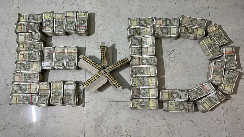 Rupees one crore in cash and bullets recovered by Enforcement Directorate (ED) sleuths from a land trader after a search in connection with an illegal land scam case, in Ranchi, Friday, June 21, 2024. (PTI Photo)