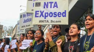 Students raise slogans during a protest over the alleged irregularities in NEET 2024 results. (PTI)