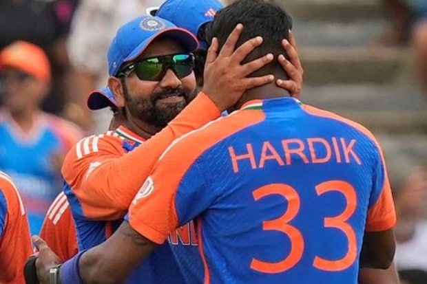 Captain Rohit Sharma hugs teammate Hardik Pandya as they celebrate their win. (AP/PTI)