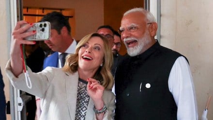Prime Minister of Italy Giorgia Meloni takes a selfie with Prime Minister Narendra Modi on the sidelines of the G7 summit, in Apulia, Italy, Friday, June 14, 2024. (PTI Photo)