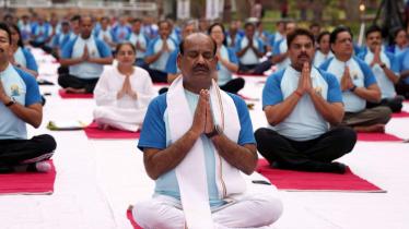 Speaker of the 17th Lok Sabha Om Birla performs yoga during the 10th International Day of Yoga, at the Parliament House complex, in Delhi. (PTI)