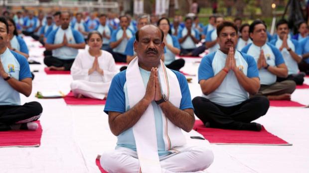 Speaker of the 17th Lok Sabha Om Birla performs yoga during the 10th International Day of Yoga, at the Parliament House complex, in Delhi. (PTI)