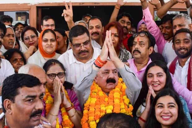 Amethi: Congress candidate from Amethi constituency Kishori Lal Sharma celebrates with others as he leads in the Lok Sabha elections on the day of the counting of votes, in Amethi, Tuesday, June 4, 2024. (PTI Photo)