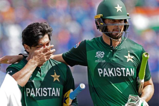 Pakistan's Shaheen Shah Afridi, right, consoles batting partner Naseem Shah as they leave the field after their loss in the ICC Men's T20 World Cup cricket match. (PTI/AP)