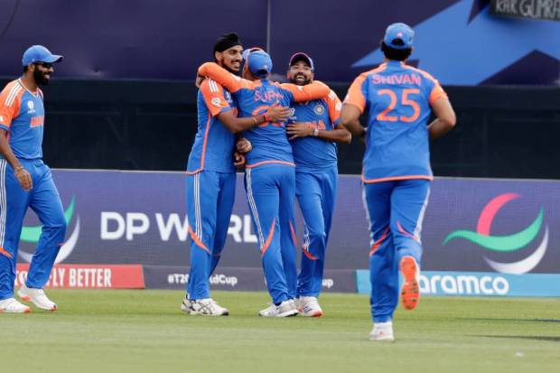 India's Mohd Siraj, second right, celebrates with teammates after taking the catch to dismiss United States' Nitish Kumar. (AP/PTI)