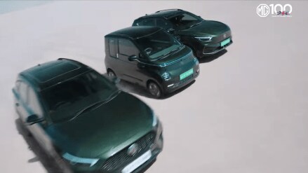 The campaign features the MG TD alongside the Hector, Astor, ZS EV, and Comet in a race formation.