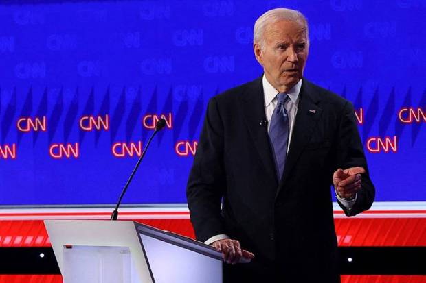 Democratic representative, US President Donald Trump reacts to Donald Trump during the debate. (Photo source: Reuters)