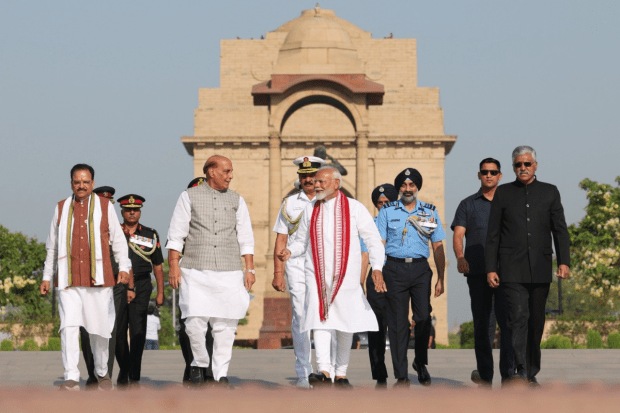 Before taking the oath of office for a third straight term, Modi, along with defence minister Rajnath Singh, assembles at the National War Memorial in New Delhi (Photo: X/@narendramodi)