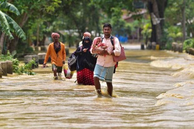 The death toll from floods and storms since May 28 has risen to 18, with two deaths reported in Cachar and one in Nagaon. Rivers continue to be in spate, forcing affected individuals to seek refuge in relief camps. (PTI Photo)