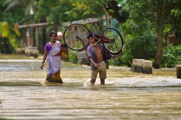 Three major rivers – Kopili, Barak, and Kushiyara – continue to flow above the danger level. Nagaon is the worst-hit district, with 3,03,567 people affected, followed by Cachar (1,09,798) and Hojai (86,382). (PTI Photo)