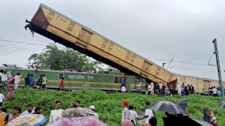 Locals gather after the Kanchanjungha Express collided with a goods train, near New Jalpaiguri railway station, on Monday, June 17, 2024. (PTI Photo)