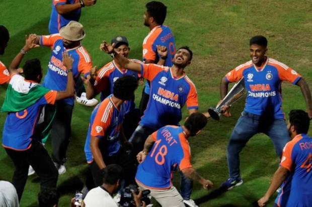 Indian team cricketers dance during a victory lap to celebrate winning the ICC Men's T20 World Cup. (PTI)