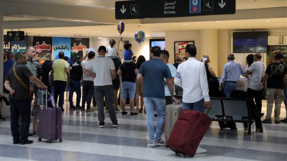 People stand at the Beirut Airport in Lebanon