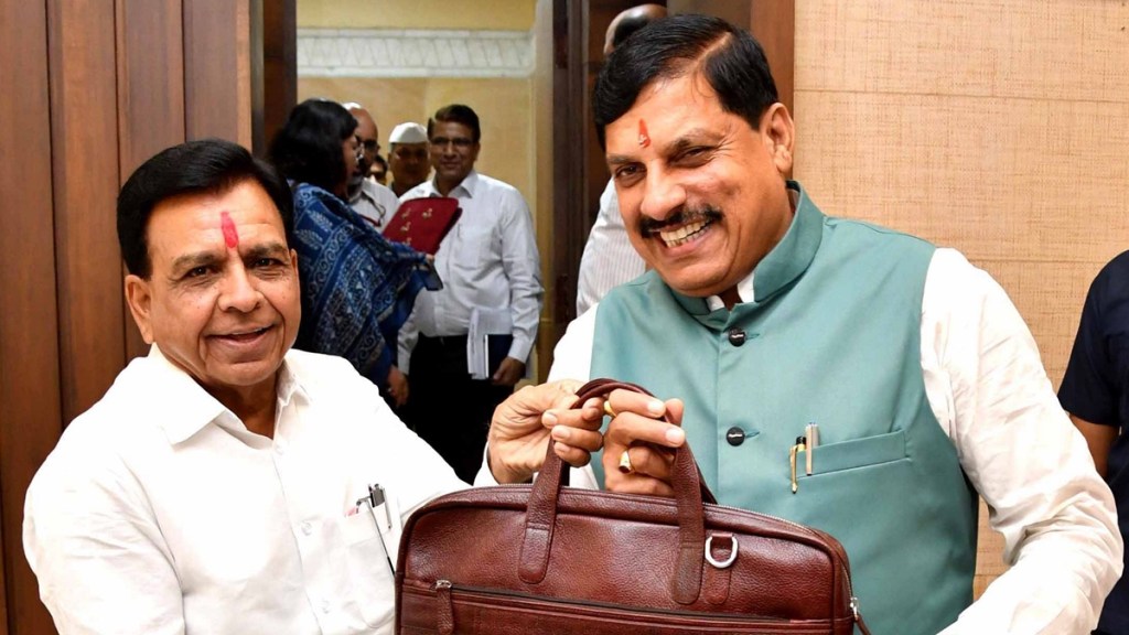 Madhya Pradesh Chief Minister Mohan Yadav with Deputy CM and Finance Minister Jagdish Devda before presentation of the annual budget in the State Legislative Assembly during the ongoing Monsoon session, in Bhopal, Wednesday, July 3, 2024. (PTI Photo) Madhya Pradesh Chief Minister Mohan Yadav with Deputy CM and Finance Minister Jagdish Devda before presentation of the annual budget in the State Legislative Assembly during the ongoing Monsoon session, in Bhopal, Wednesday, July 3, 2024. (PTI Photo)