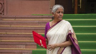 Union Finance Minister Nirmala Sitharaman with a red pouch carrying the Budget documents arrives at the Parliament to present the Union Budget 2024-25, in New Delhi, Tuesday, July 23, 2024. (PTI Photo/Atul Yadav