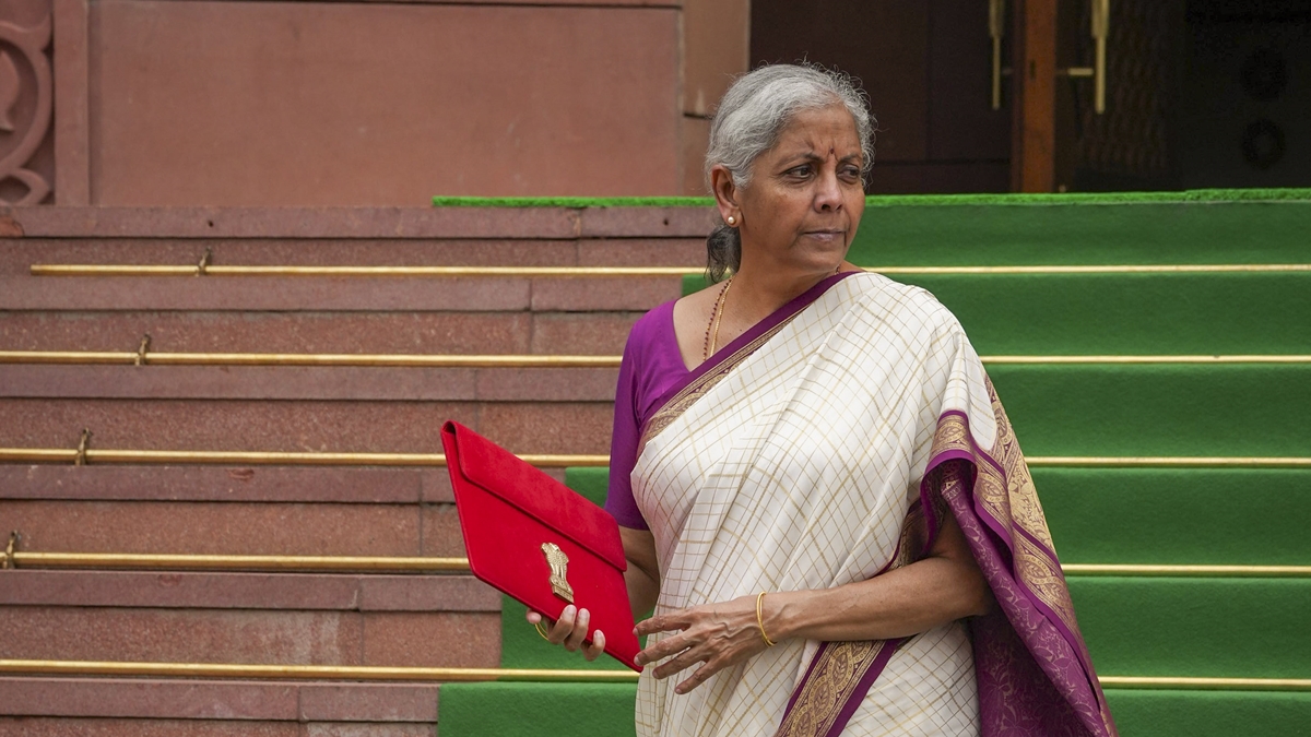 Union Finance Minister Nirmala Sitharaman with a red pouch carrying the Budget documents arrives at the Parliament to present the Union Budget 2024-25, in New Delhi, Tuesday, July 23, 2024. (PTI Photo/Atul Yadav Union Finance Minister Nirmala Sitharaman with a red pouch carrying the Budget documents arrives at the Parliament to present the Union Budget 2024-25, in New Delhi, Tuesday, July 23, 2024. (PTI Photo/Atul Yadav