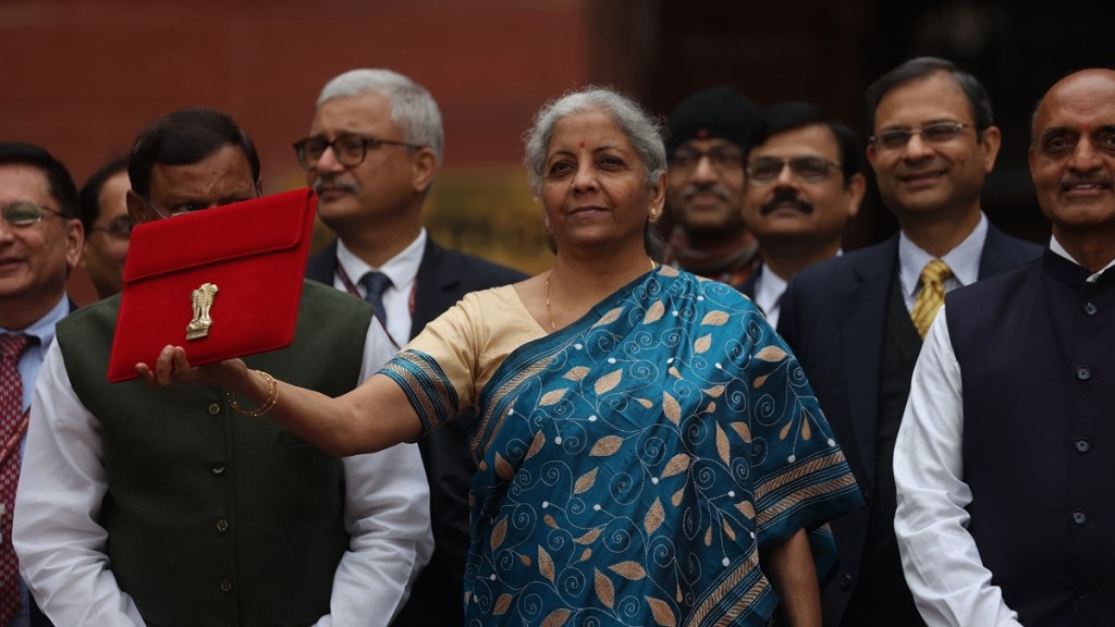 Budget 2024, Economic Survey: Nirmala Sitharaman poses along with officials. (File Image) Budget 2024, Economic Survey: Nirmala Sitharaman poses along with officials. (File Image)
