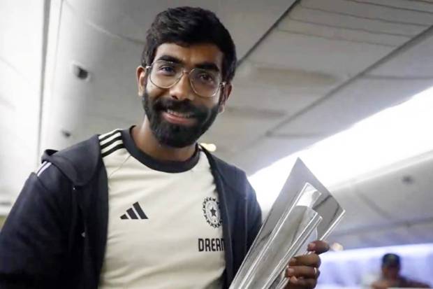 Indian cricketer Jasprit Bumrah aboard a charter flight to New Delhi. (PTI)