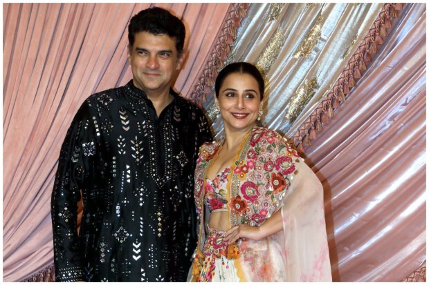 Bollywood actor Vidya Balan looked stunning while getting papped with her husband and film producer Siddharth Roy Kapur at the much talked about Ambani Sangeet ceremony. (Image: PTI)