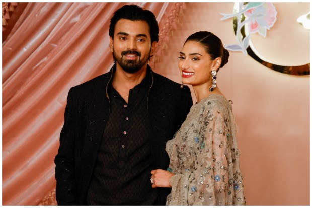 Indian cricketer KL Rahul and his wife, actress Athiya Shetty were all smiles at the red carpet of the traditional ceremony. (Image: Reuters/Francis Mascarenhas)