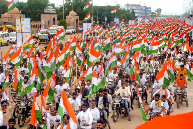 On the eve of Independence Day, people participate in a 