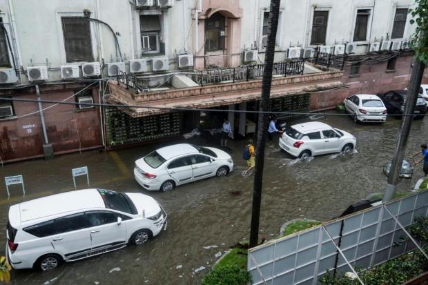 New Delhi: Waterlogging near the Income Tax Office after heavy rainfall. (PTI)