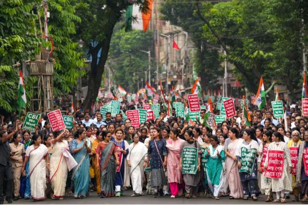Kolkata: West Bengal Chief Minister and TMC chief Mamata Banerjee along with party leaders and supporters takes part in a protest rally demanding justice for a woman doctor who was raped and murdered at RG Kar Medical College and Hospital. (PTI)