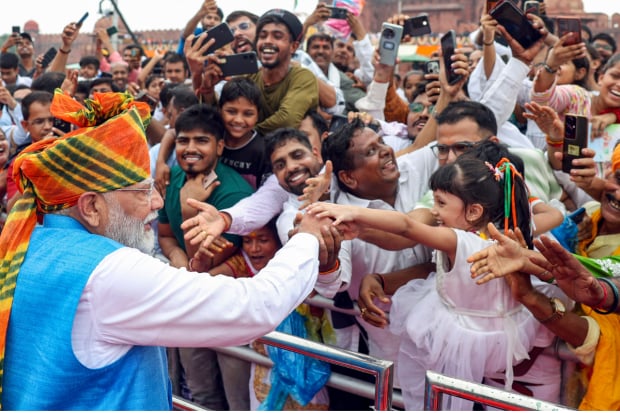 People outside Red Fort are eager to meet Prime Minister Modi. (Photo: PTI)