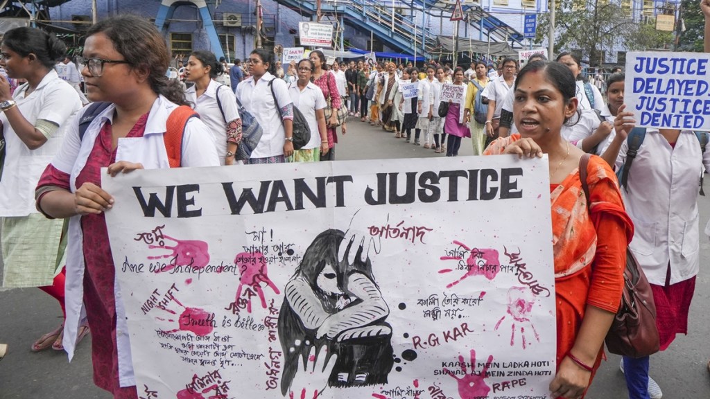 Nurses take part in a protest march over the alleged sexual assault and murder of a postgraduate trainee doctor, in Kolkata, Sunday, Aug. 25, 2024. (PTI Photo)