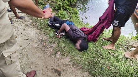 Body of prime accused in the alleged rape of a minor girl after being recovered from a pond, at Dhing, in Nagaon district, Saturday, Aug. 24, 2024.