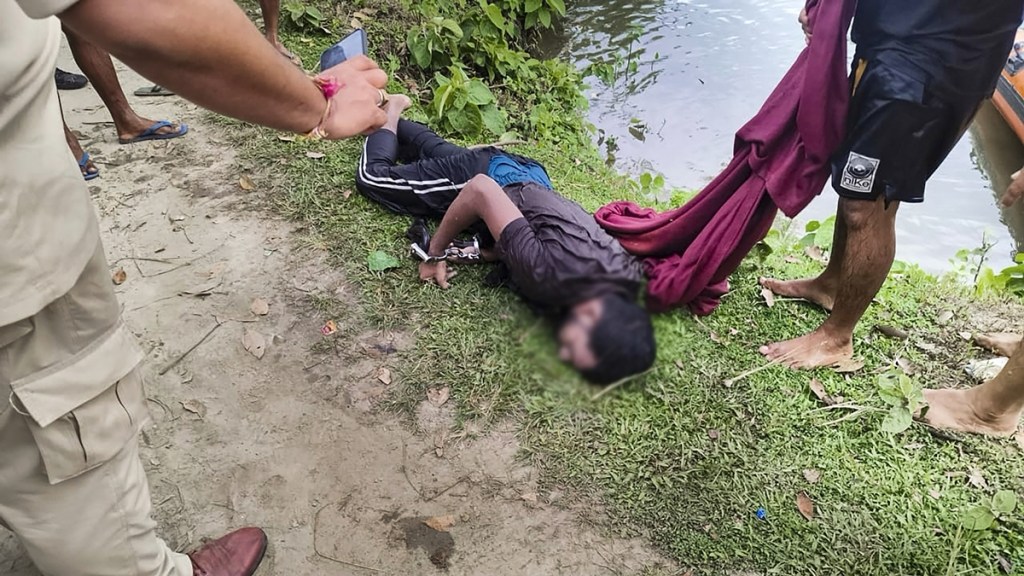 Body of prime accused in the alleged rape of a minor girl after being recovered from a pond, at Dhing, in Nagaon district, Saturday, Aug. 24, 2024. Body of prime accused in the alleged rape of a minor girl after being recovered from a pond, at Dhing, in Nagaon district, Saturday, Aug. 24, 2024.