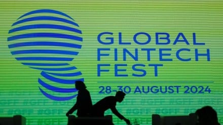 People walk past a logo of the Global Fintech Fest in Mumbai, India, August 28, 2024. REUTERS People walk past a logo of the Global Fintech Fest in Mumbai, India, August 28, 2024. REUTERS
