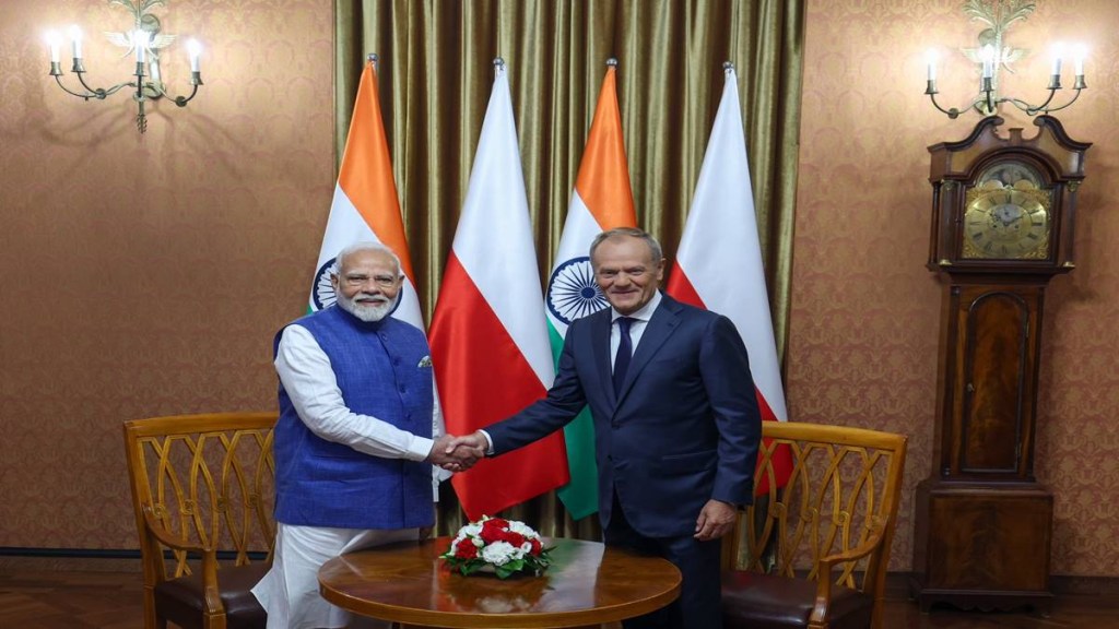 PM Modi with Donald Tusk PM Modi with Donald Tusk