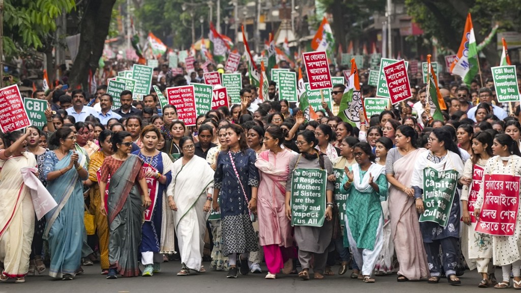 West Bengal Chief Minister and TMC chief Mamata Banerjee along with party leaders and supporters takes part in a protest rally demanding justice for a woman doctor who was allegedly raped and murdered at R G Kar Medical College and Hospital, in Kolkata, Friday, August 16, 2024. (PTI Photo/Edited) West Bengal Chief Minister and TMC chief Mamata Banerjee along with party leaders and supporters takes part in a protest rally demanding justice for a woman doctor who was allegedly raped and murdered at R G Kar Medical College and Hospital, in Kolkata, Friday, August 16, 2024. (PTI Photo/Edited)