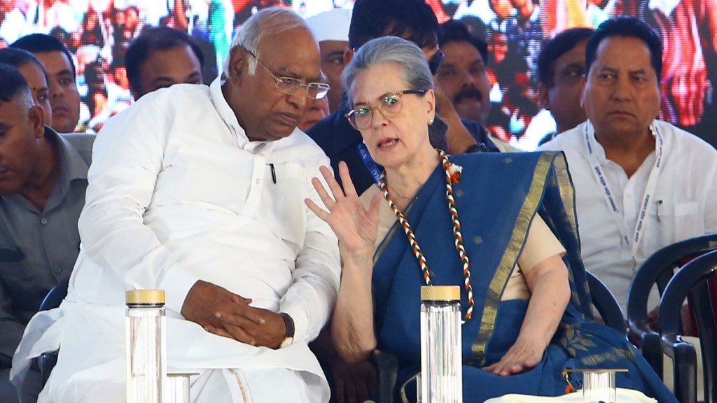 Congress President Mallikarjun Kharge with party leader Sonia Gandhi during a public meeting ahead of Lok Sabha elections in Jaipur on Saturday. Express Photo