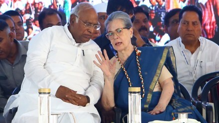 Congress President Mallikarjun Kharge with party leader Sonia Gandhi during a public meeting ahead of Lok Sabha elections in Jaipur on Saturday. Express Photo