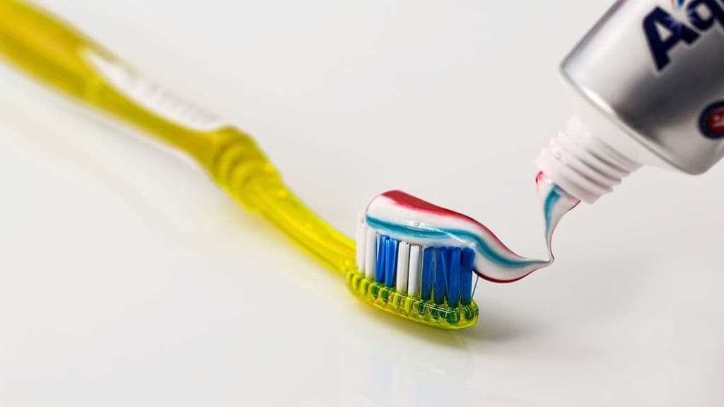 fluoride toothpaste, fluoride toothpaste benefits, fluoride toothpaste side effects, oral health, health news, wellness news,