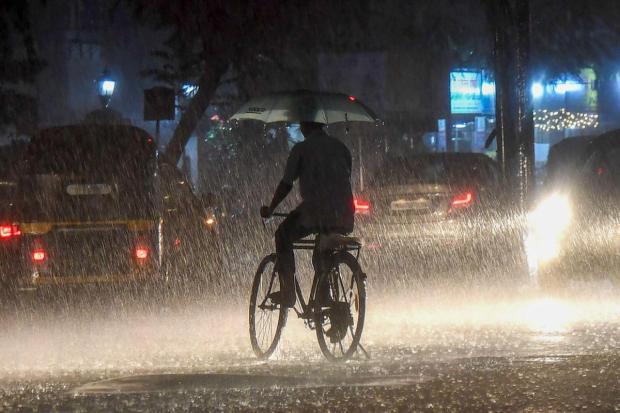 The heavy rains caused chaos on Wednesday evening, turning some roads into fast-moving rivers. (PTI)