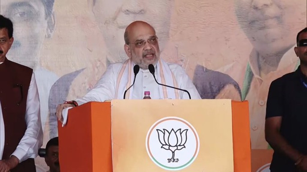 Union Home Minister and BJP leader Amit Shah speaks during a public meeting for J&K Assembly elections, at Chenani, in Udhampur district, Jammu & Kashmir, Thursday, Sept. 26, 2024.