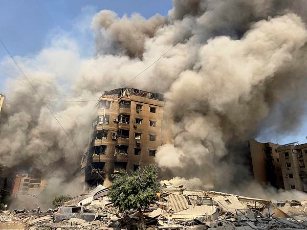 Smoke rises as a building collapses in Beirut's southern suburbs, Saturday, Sept. 28, 2024. (AP/PTI)