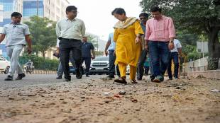 Delhi CM Atishi inspecting potholes