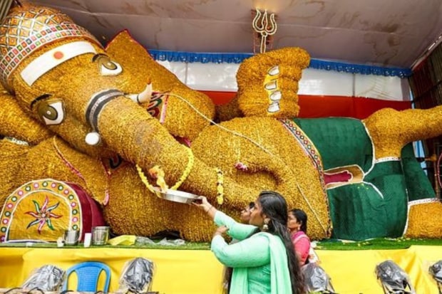 Devotees offer prayers to Lord Ganesh during the Ganesh Chaturthi celebrations, in Chennai. (Photo: PTI)