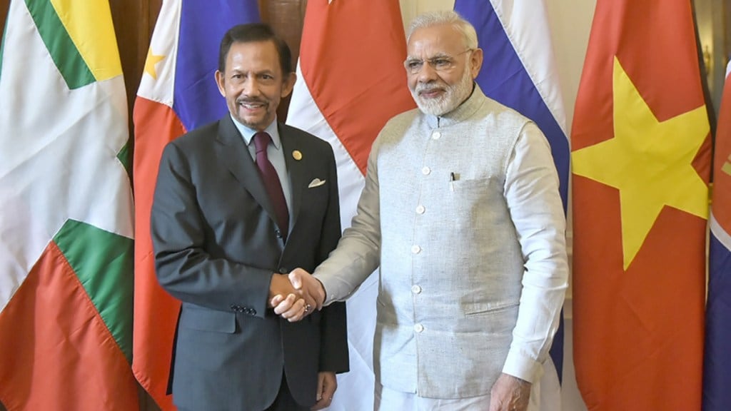 Prime Minister Narendra Modi (R) welcomes Sultan of Brunei Haji Hassanal Bolkiah prior to a bilateral meeting on the sidelines of ASEAN-INDIA Commemorative Summit, in New Delh.