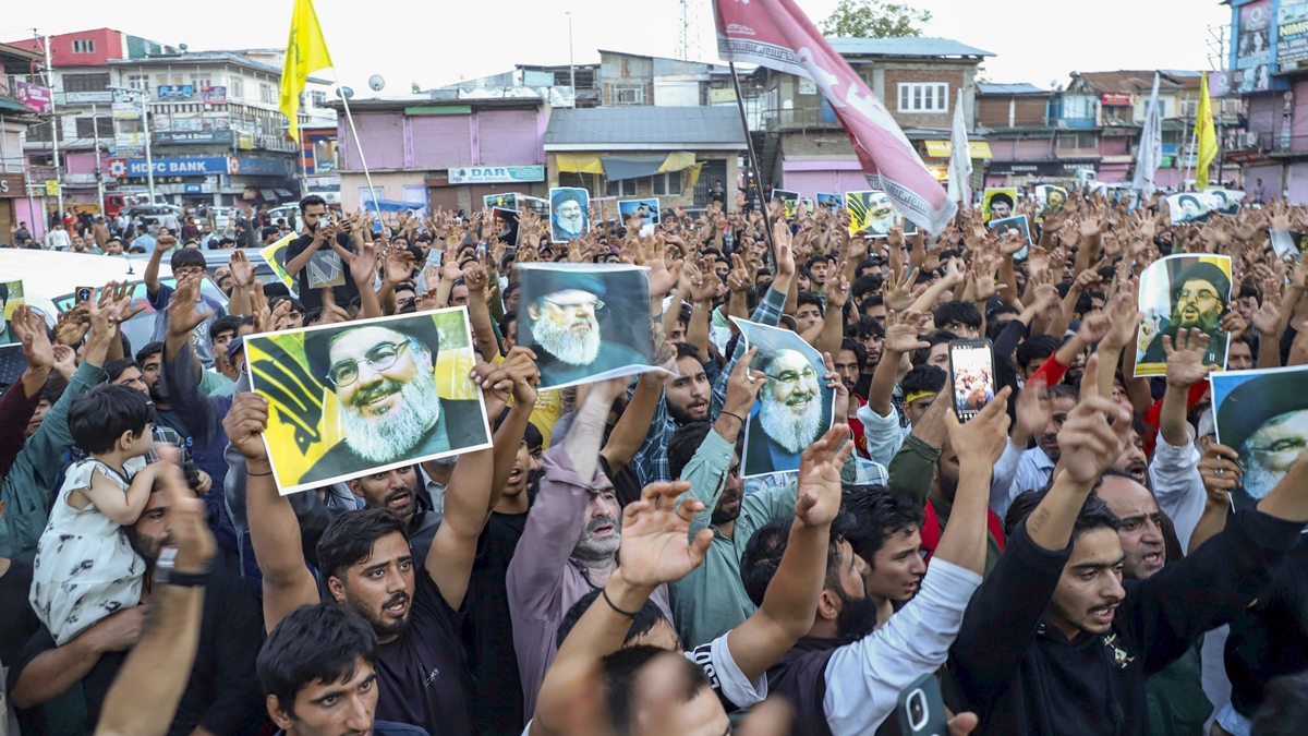Kashmiri Shia Muslim protesters shout anti-Israeli and anti-U.S slogans during their protest march against the killing of Hezbollah leader Hassan Nasrallah in Israeli airstrikes in Beirut, Lebanon, at Magam in Budgam district of Central Kashmir, Saturday, Sept. 28, 2024. (PTI Photo)