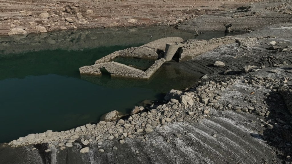 Amid a drought in Greece, the sunken village of Kallio in Greece has reappeared after 45 years. The emergence of the village is from the Lake of Mornos in central Greece. (Image Source Reuters)